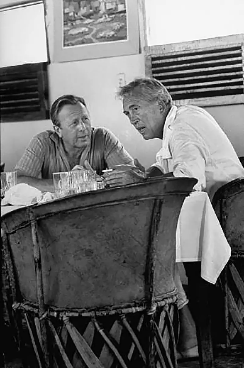 Ray Stark and John Huston during The Iguana