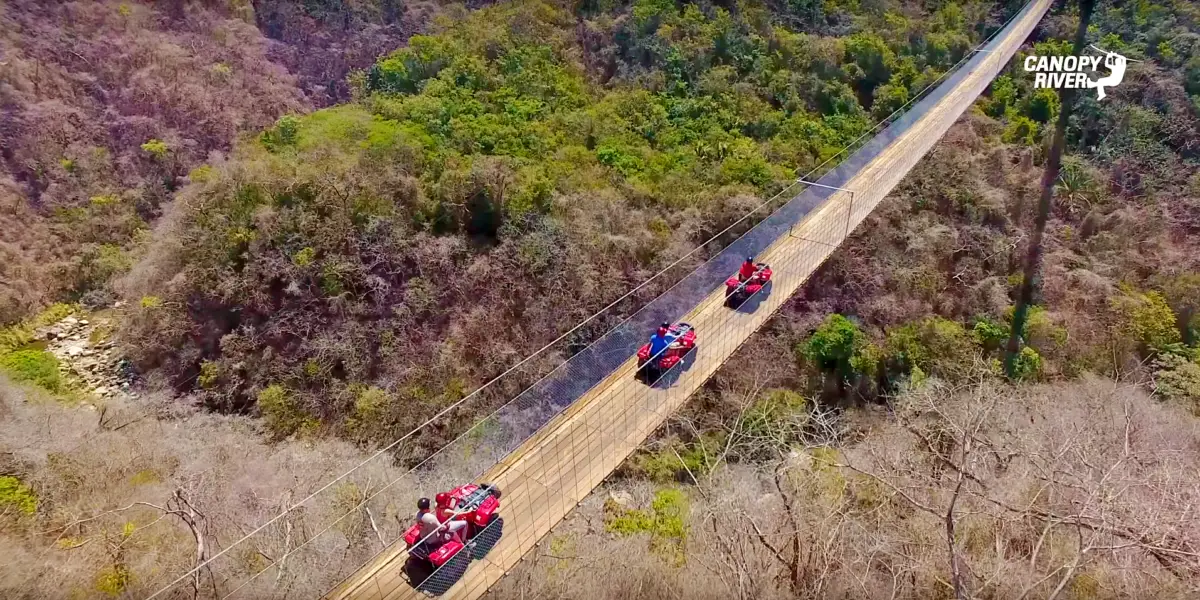 ATVs crossing the Jorullo Bridge