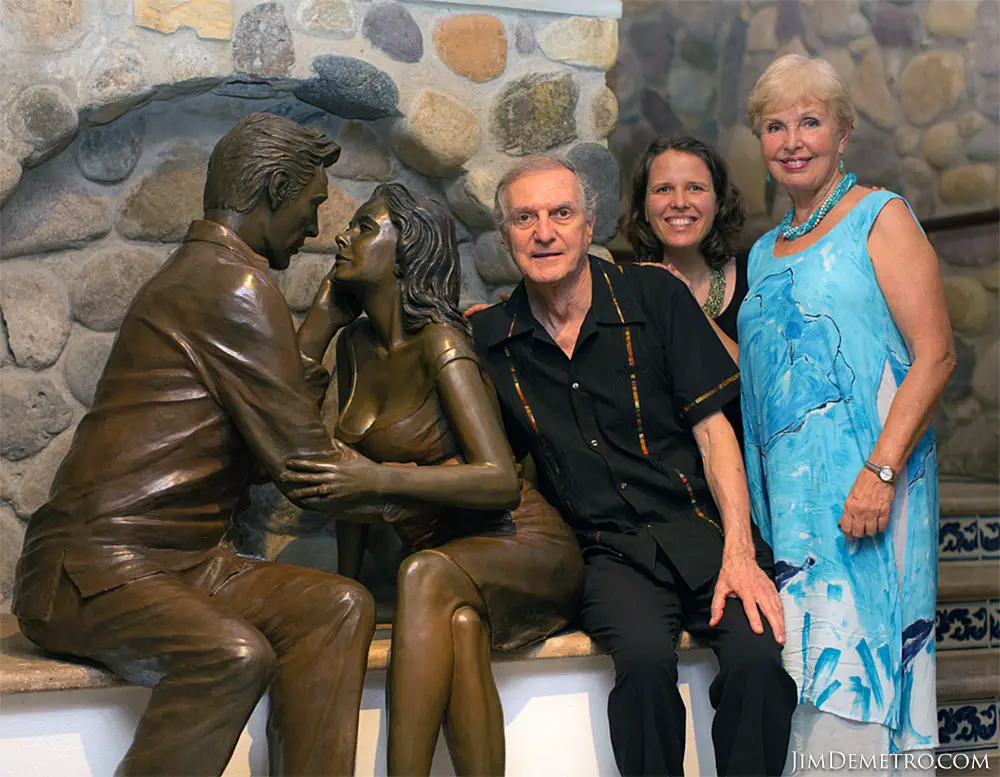 Jim Demetro, wife and daughter with the new sculpture, Elizabeth Taylor and Richard Burton