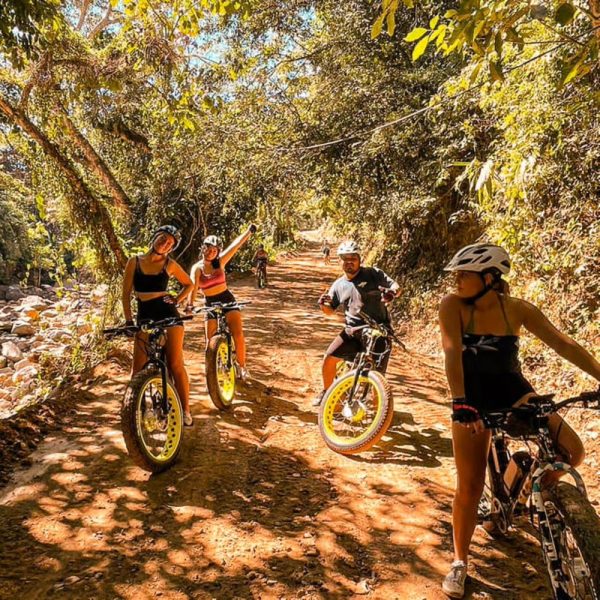 Mountain bikers riding a forest trail near Puerto Vallarta