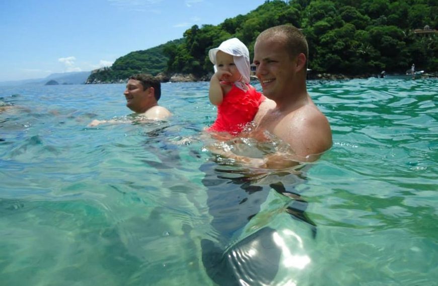 Puerto Vallarta beach during the summer vacation season with safety patrols and ocean conditions in view