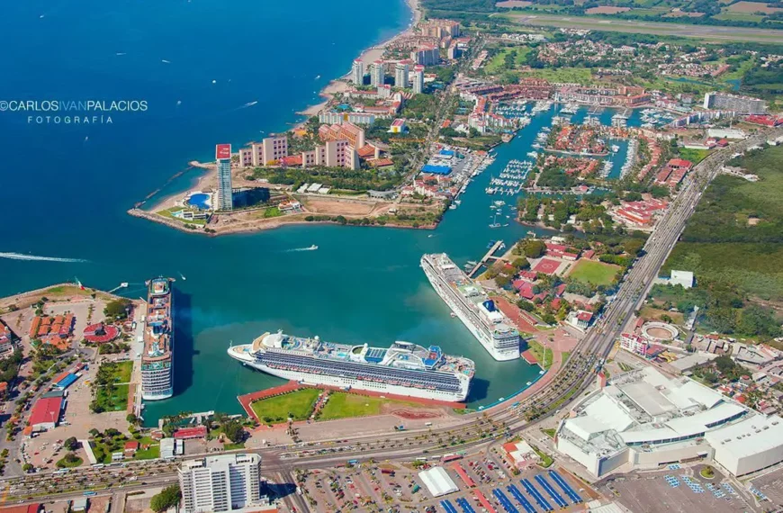 Cruise ships docked at Puerto Vallarta’s maritime terminal, with Marina Vallarta and the Pacific coast visible from above