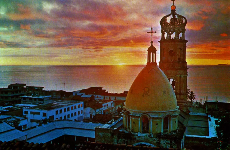 Our Lady of Guadalupe Parish crown and dome at sunset over Banderas Bay in Puerto Vallarta