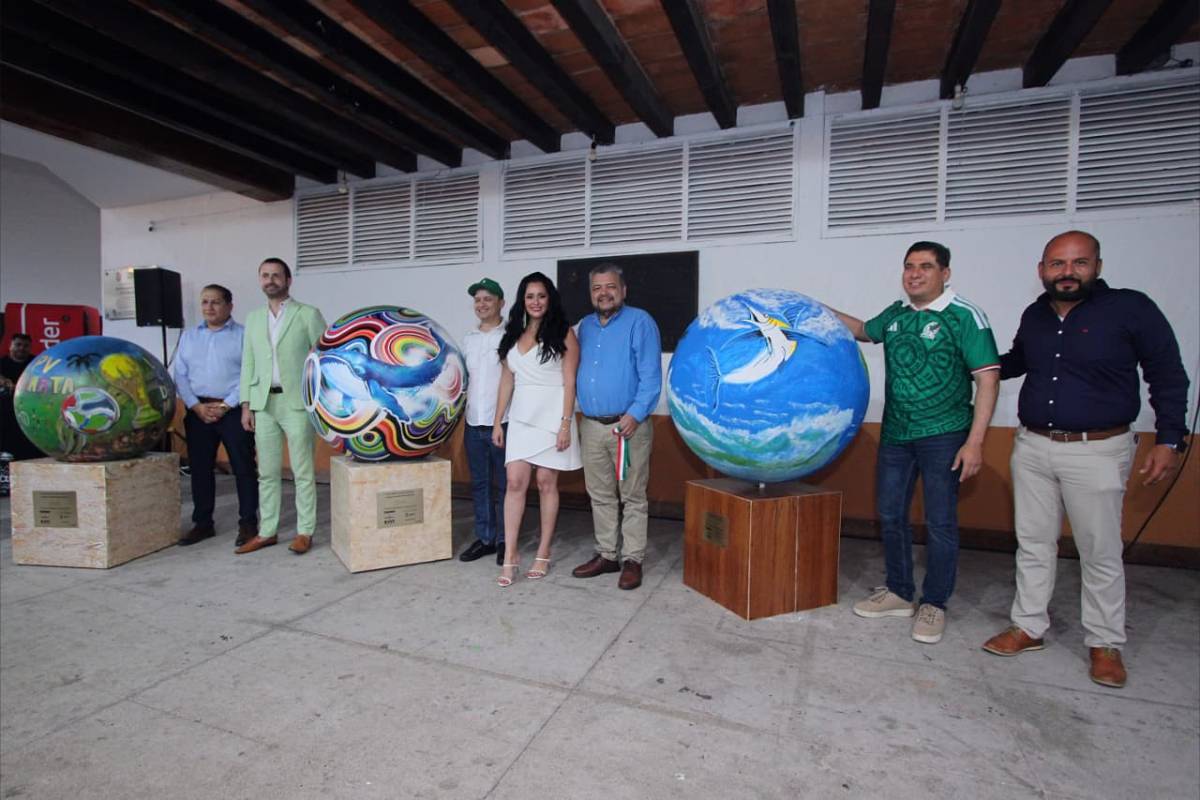 Monumental painted soccer balls from the Puerto Vallarta Encuentro del Mundo public art exhibition.