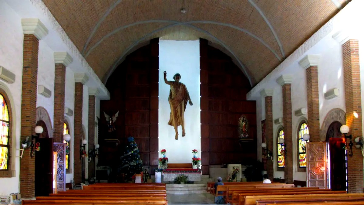 Warm church interior in Puerto Vallarta for a choral concert news brief