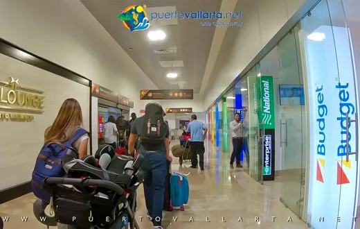 Car rental and lobby transition after the Puerto Vallarta airport timeshare corridor
