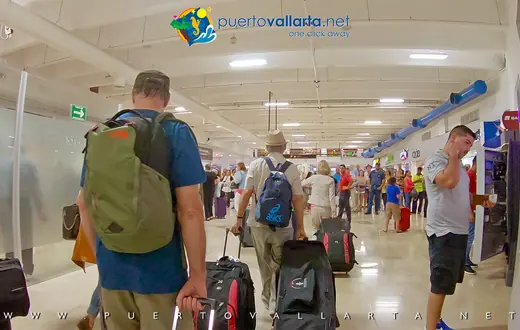 Exit toward the public lobby after passing through the Puerto Vallarta airport sales corridor